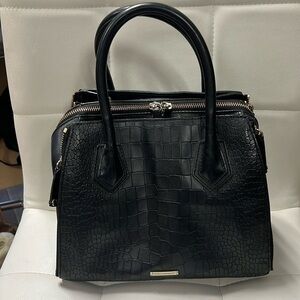 Absolutely beautiful Rebecca Minkoff purse very light stain on interior fabric